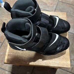 Nike Kids Black and White High-Top Cleats